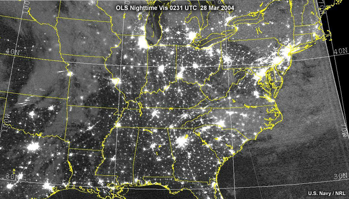 OLS nighttime visible image with first quarter moon over US showing city lights
