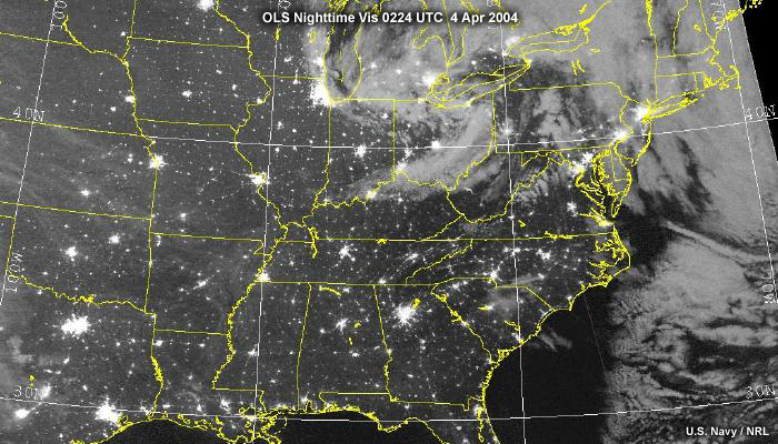 OLS nighttime visible image at nearly full moon showing dimmer cities and more clouds.
